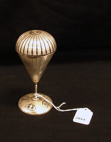 Appraisal: Silver plate cup being parachutist under canopy with base featuring