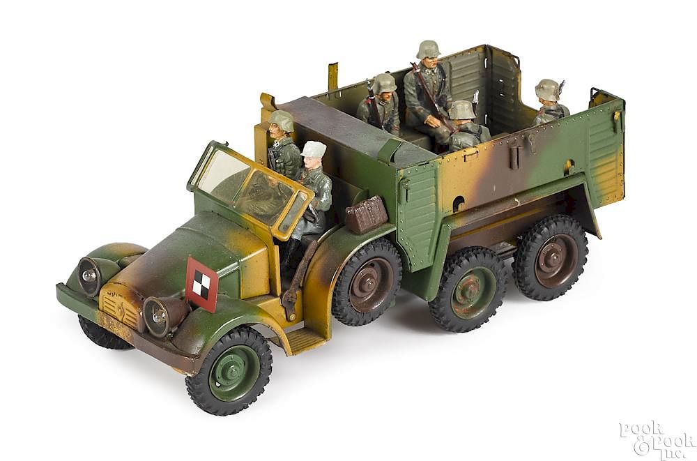 Appraisal: Lineol camouflage painted tin clockwork truck Lineol camouflage painted tin