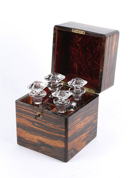 Appraisal: A VICTORIAN COROMANDEL DECANTER BOX the velvet lined interior with