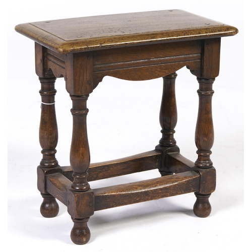 Appraisal: An oak joined stool with ovolu moulded top and baluster