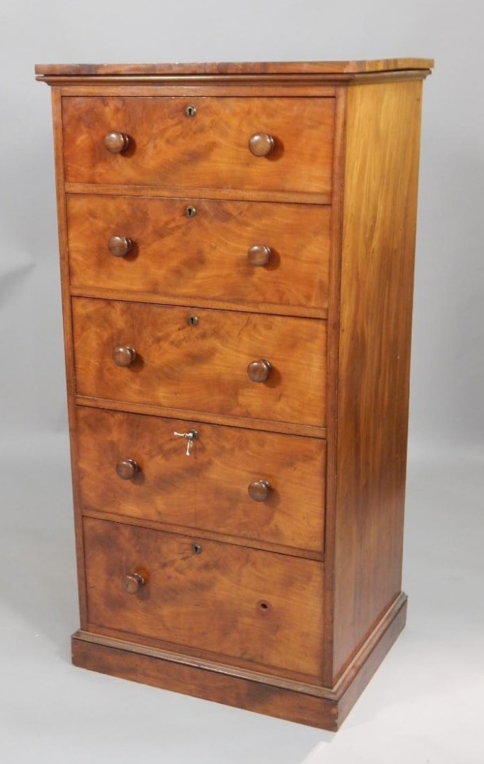 Appraisal: An early Victorian figured mahogany narrow chest of drawers the