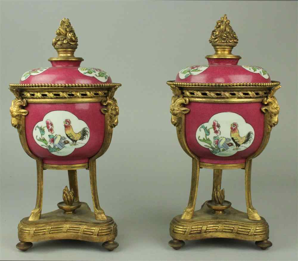 Appraisal: PAIR OF GILT-BRONZE MOUNTED SAMSON PINK GROUND FAMILLE ROSE COVERED