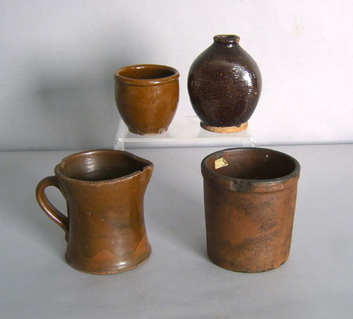 Appraisal: Redware pitcher together with small crocks and a flask tallest