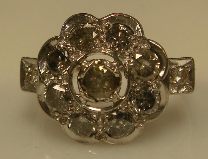 Appraisal: K WG Flower Form Diamond Ring Eleven full cut diamonds