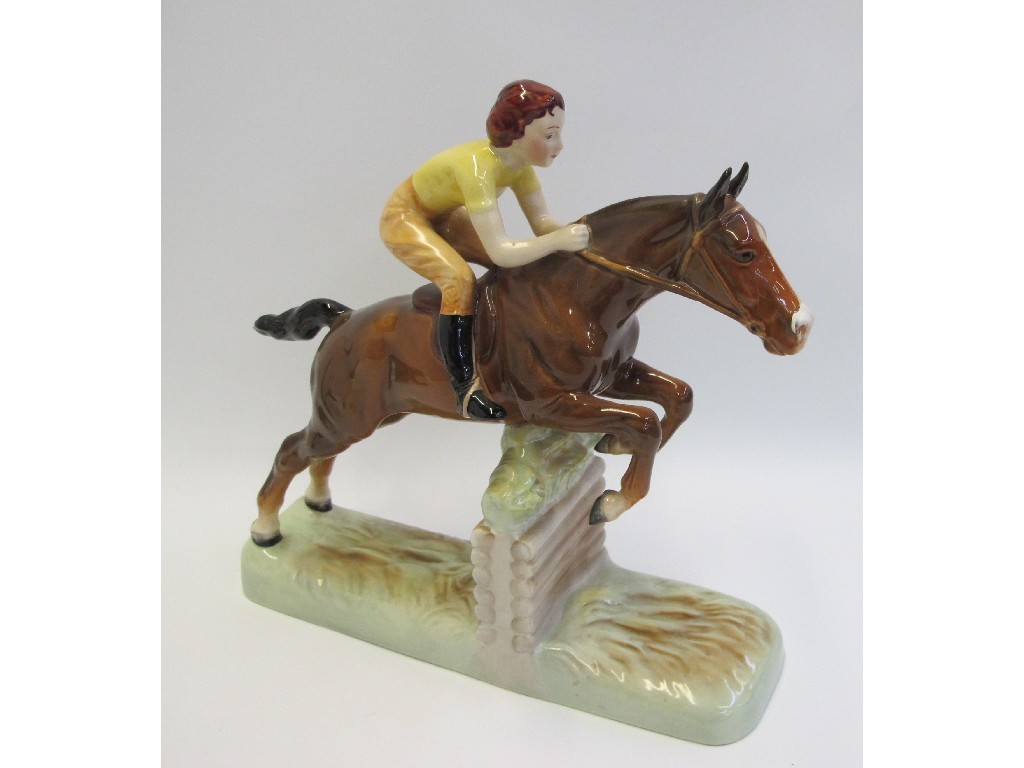 Appraisal: Beswick group of a girl on horseback jumping a fence