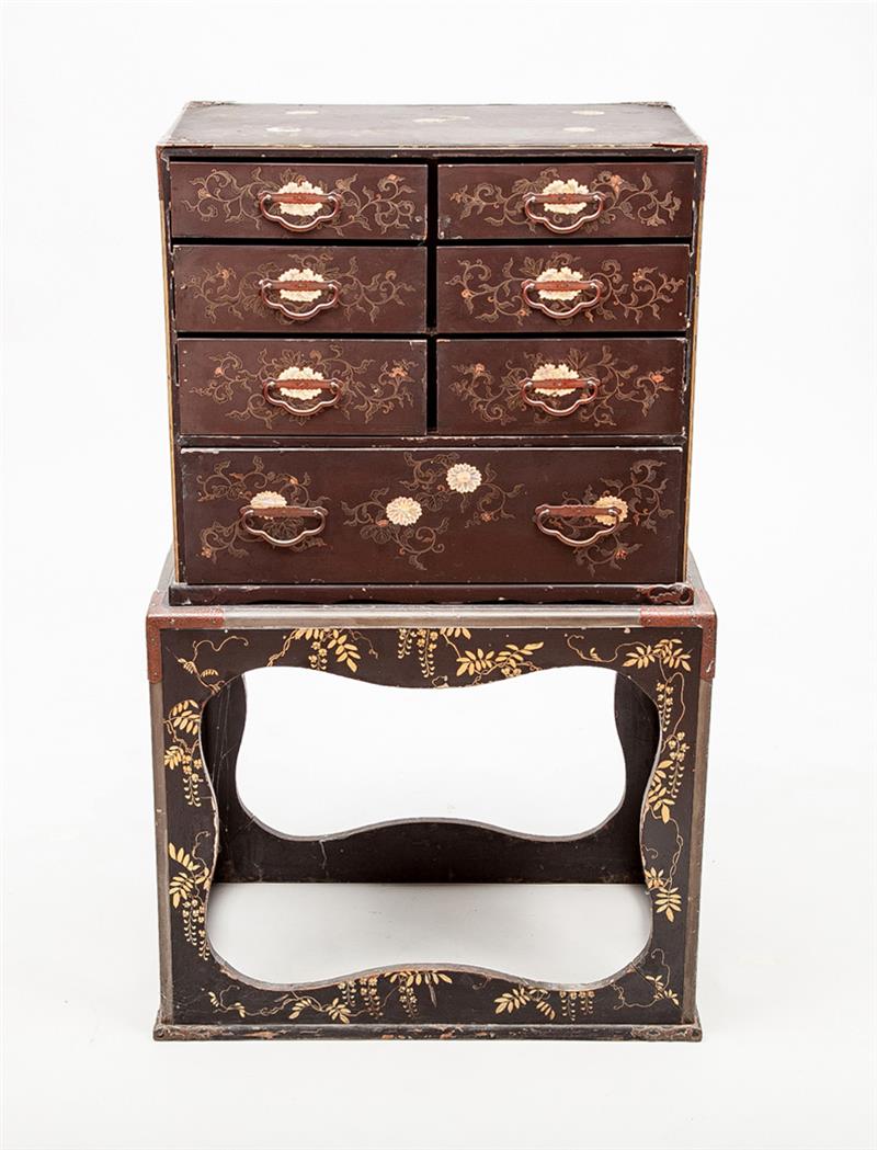 Appraisal: JAPANESE MOTHER-OF-PEARL INLAID LACQUER CABINET ON STAND With incised copper