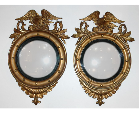 Appraisal: Pair of Regency Style Gilt-Wood Convex Mirrors Estimate -