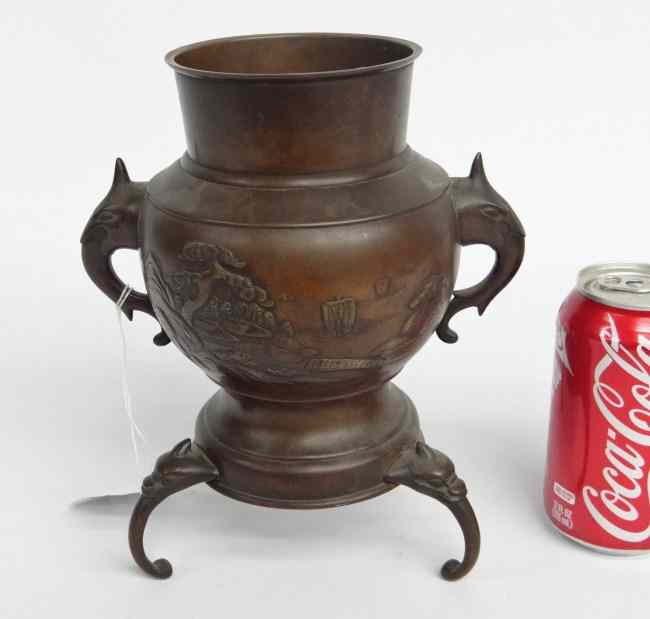 Appraisal: Asian bronze pot with stylized handles and feet '' Ht