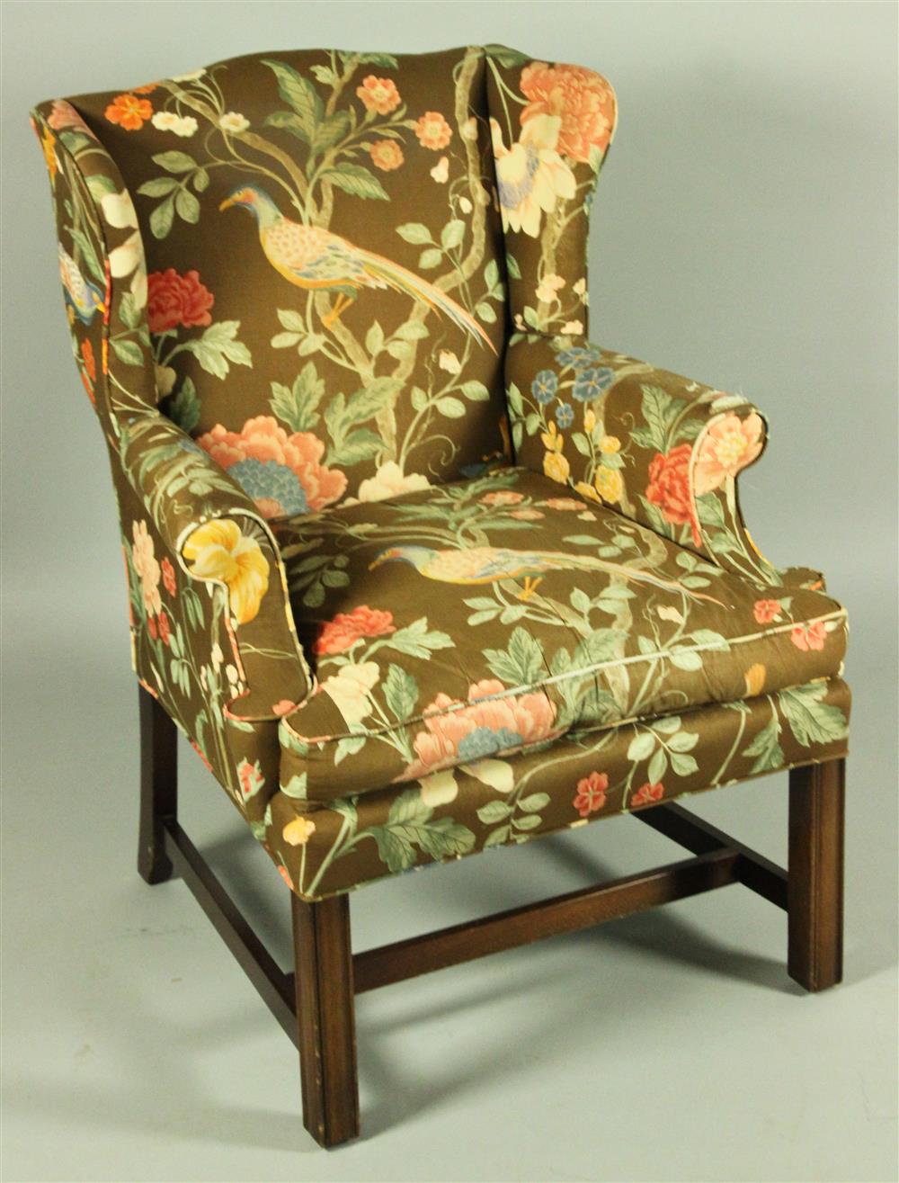 Appraisal: GEORGE III STYLE MAHOGANY BROWN CHINTZ WING CHAIR gently arched