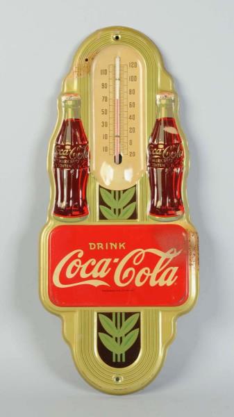 Appraisal: Coca-Cola Tin Embossed Thermometer A few dents and two burned