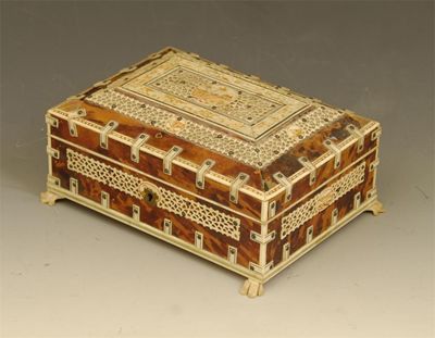 Appraisal: An Anglo-Indian tortoiseshell ivory and lac decorated casket with pierced