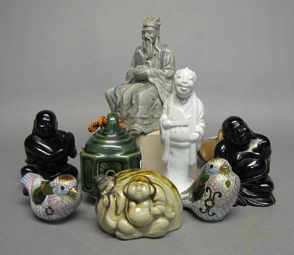 Appraisal: The Chinese wares including one glazed Yixing figure of a