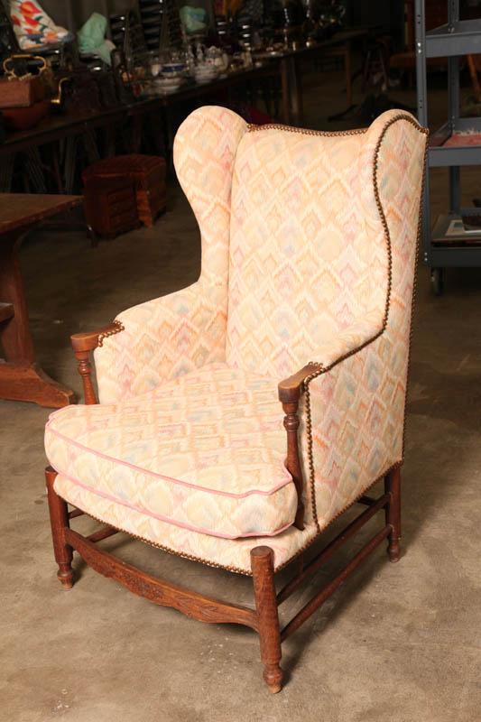 Appraisal: PAIR OF WINGBACK CHAIRS Walnut frames with turned arms carved