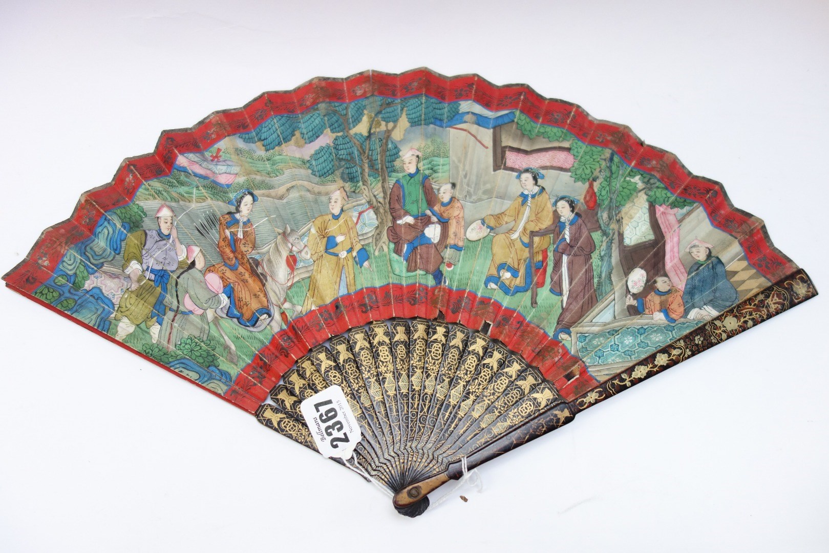 Appraisal: A Chinese gilt lacquer and painted paper fan th century