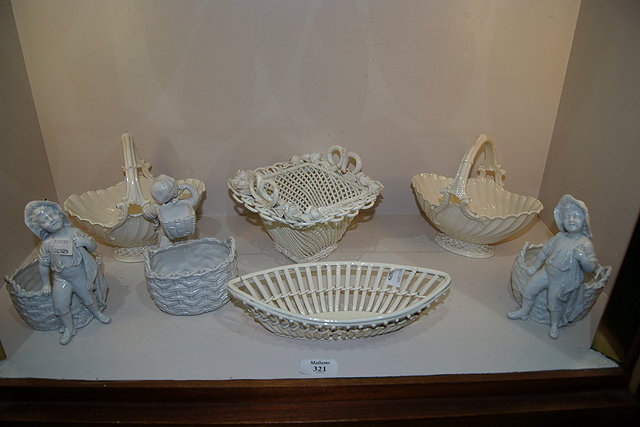 Appraisal: A CREAMWARE OPEN BASKET a pair of Royal Worcester white