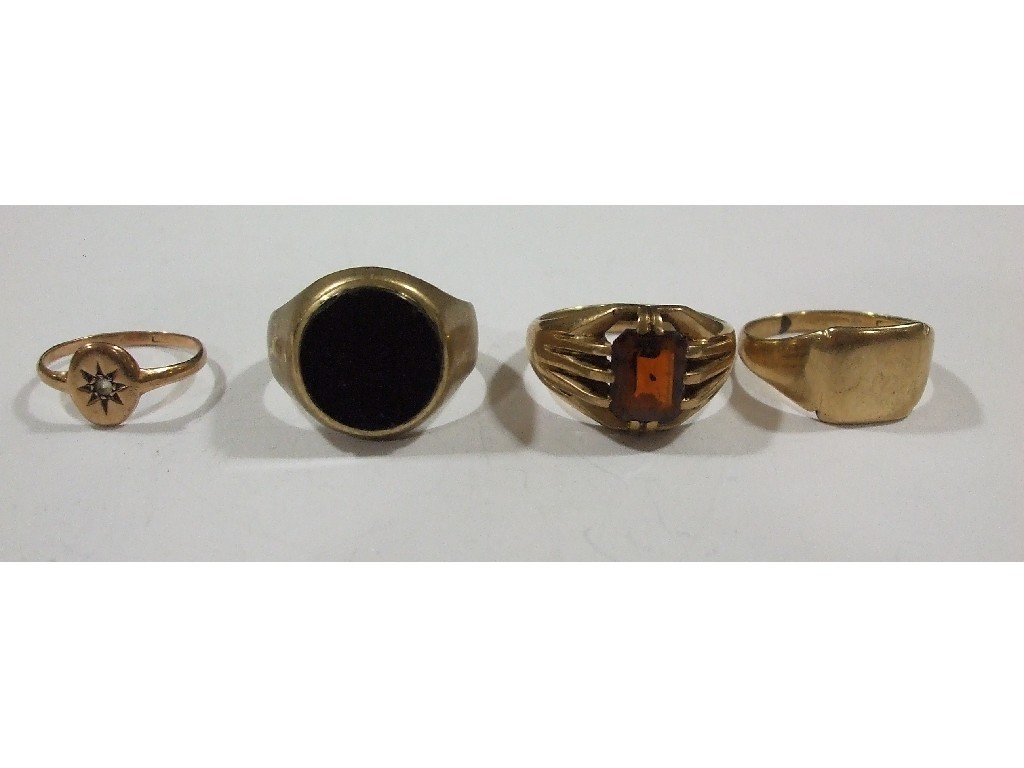 Appraisal: Four gents ct gold rings one with garnet and one