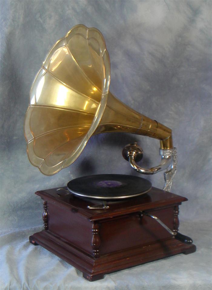 Appraisal: Reproduction victrola with record album working condition Estimate -