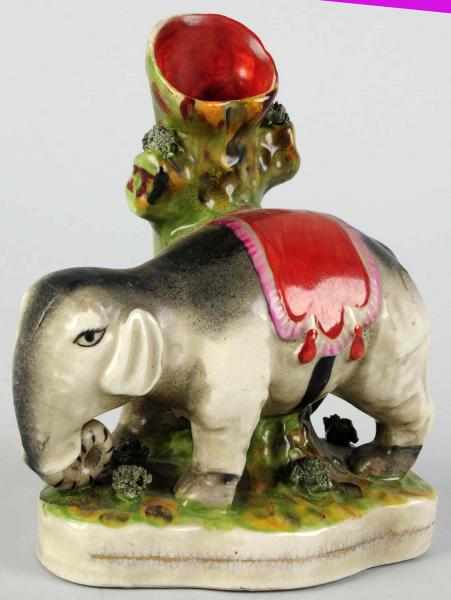 Appraisal: Pottery Elephant with Vase No damage or repairs Condition Excellent