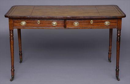 Appraisal: REGENCY MAHOGANY WRITING TABLE The top with tooled leather panel