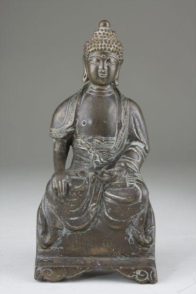 Appraisal: Tibetan Bronze Seated Buddha late th century hollow cast incised