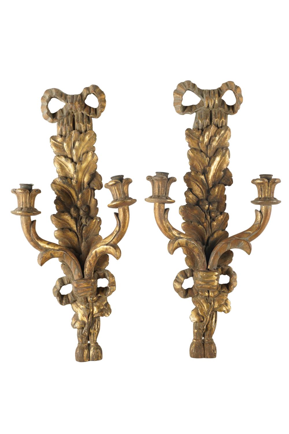 Appraisal: PAIR OF GILTWOOD TWIN-LIGHT WALL SCONCESCondition with repairs to branches