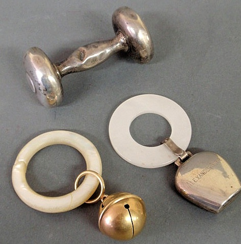 Appraisal: Baby rattle and teething ring k gold and mother-of-pearl dia