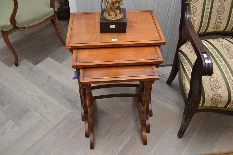 Appraisal: A QUALITY REPRODUCTION MAHOGANY FINISHED NEST OF TEA TABLES A