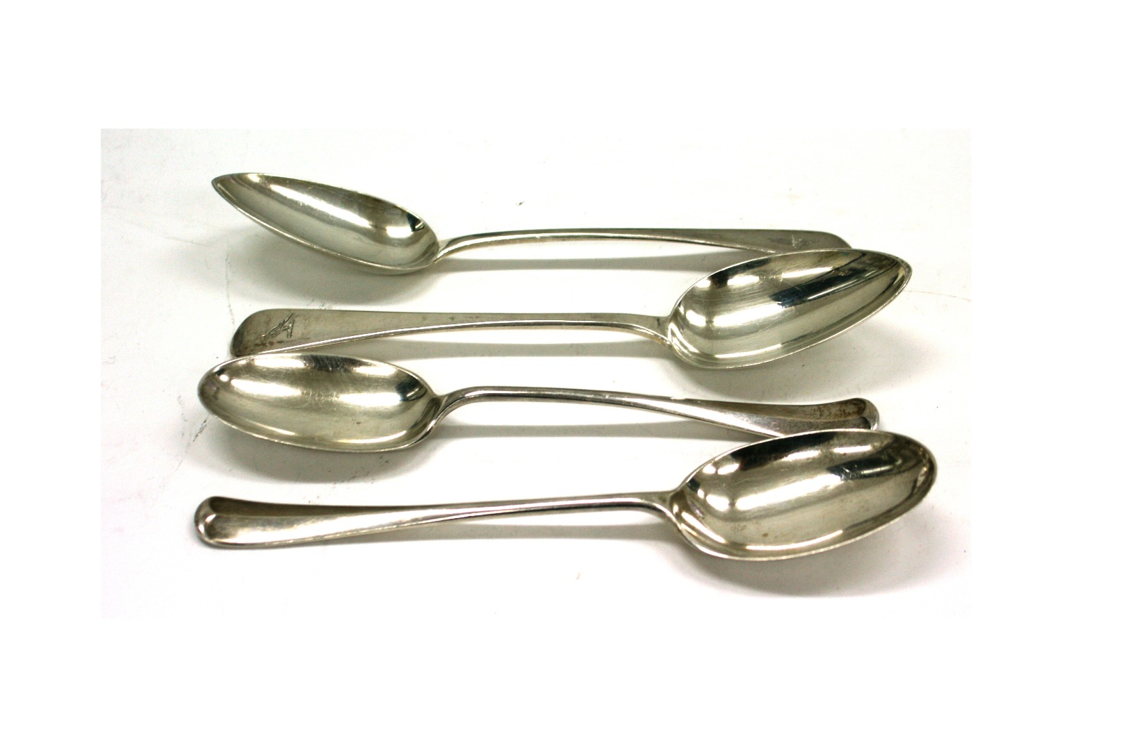 Appraisal: Two Hanoverian pattern silver tablespoons Sheffield London and two George