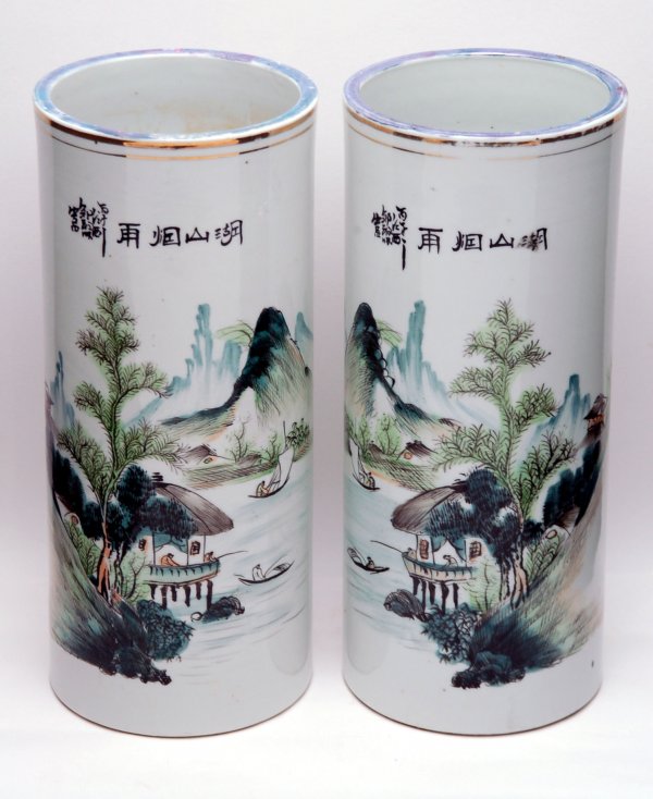 Appraisal: Pair of Chinese cylinder vases with handpainted lake scenes Chinese