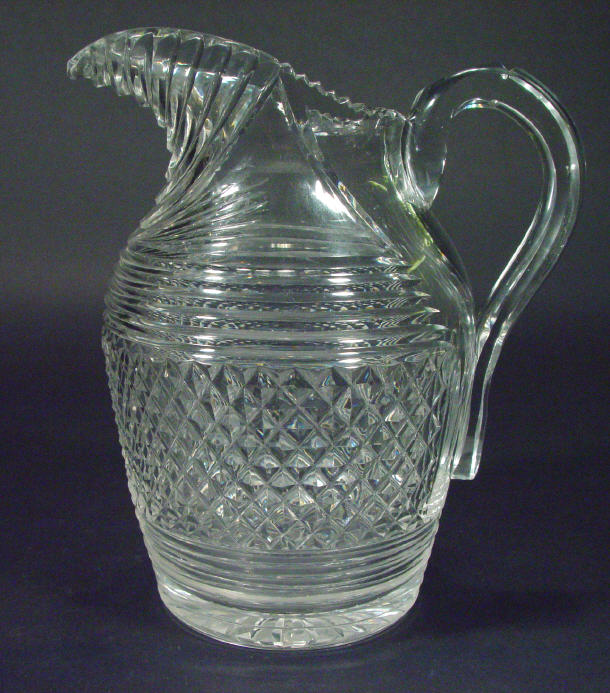 Appraisal: Irish cut glass water jug with hobnail cut and banded