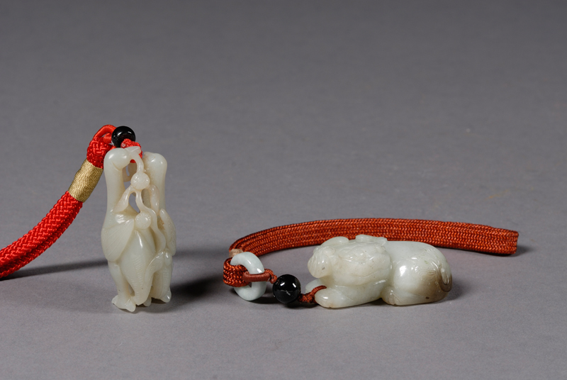 Appraisal: Two Jade Pendants China th th century a pair of