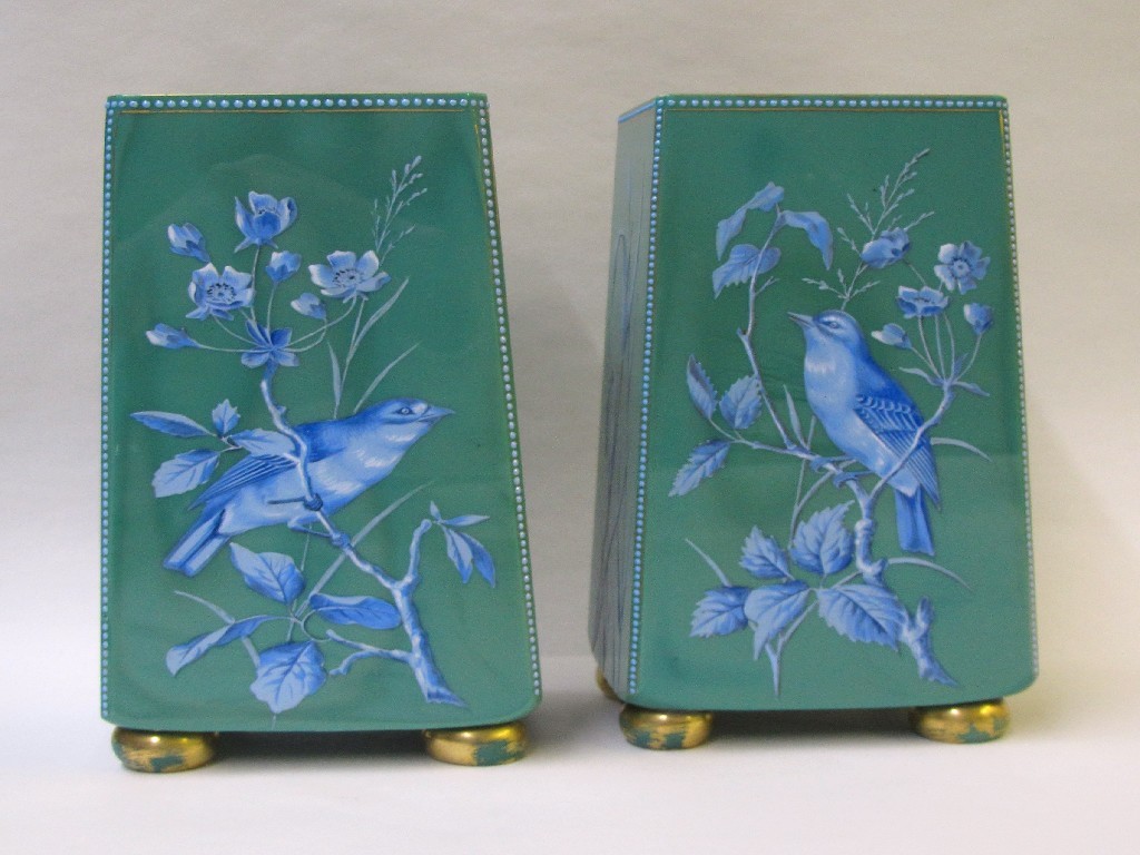 Appraisal: A pair of green glass square tapering vases painted with