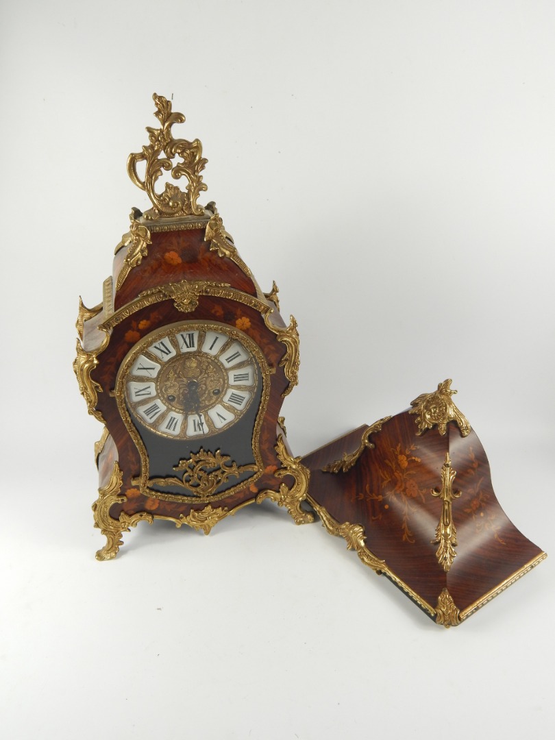 Appraisal: A German rosewood and marquetry floral inlaid bracket clock with