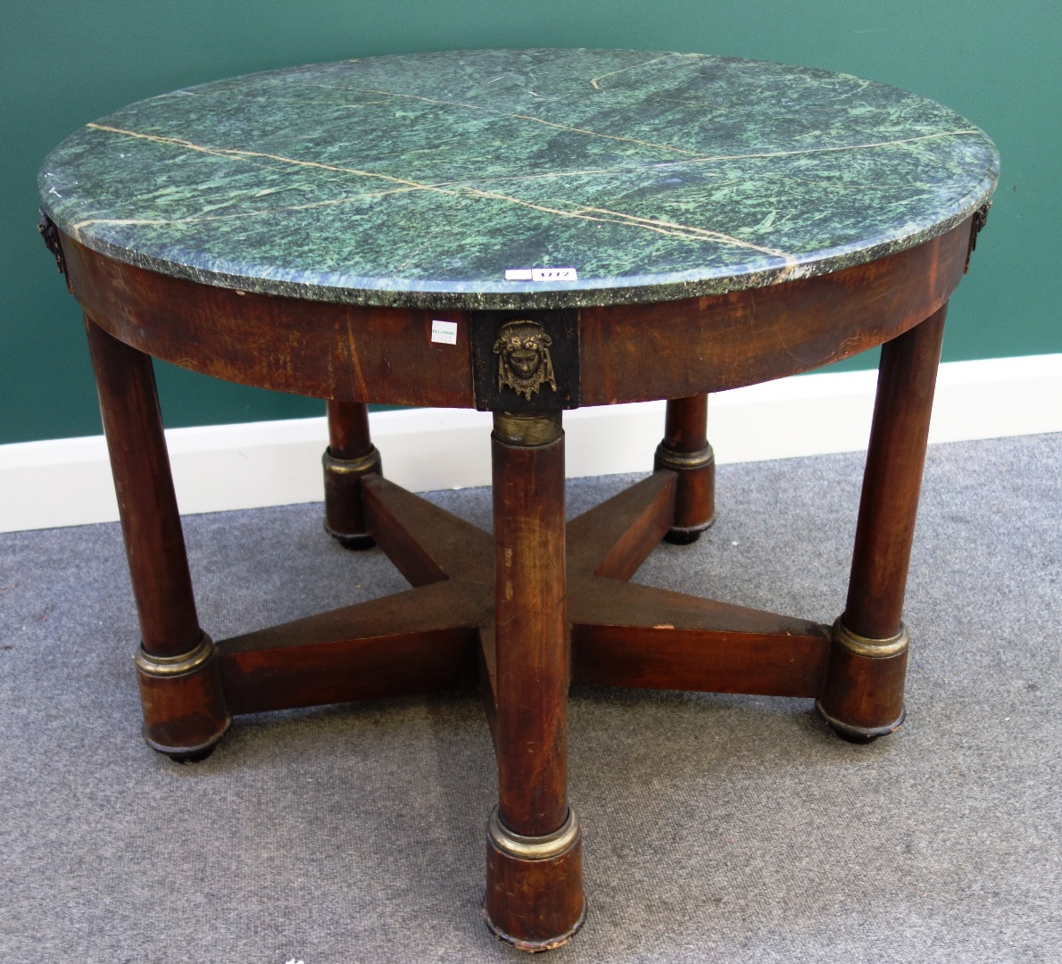 Appraisal: An Empire style centre table the circular marble top over