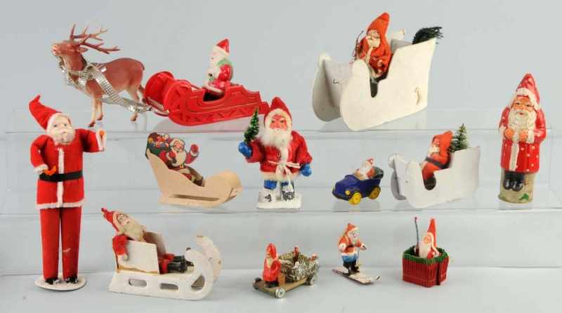 Appraisal: Lot of Christmas Decorations Description Includes six Santas with sleighs