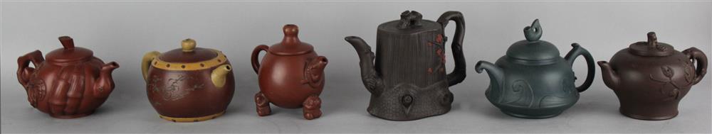 Appraisal: COLLECTION OF SIX CHINESE YIXING TEAPOTS the group including a