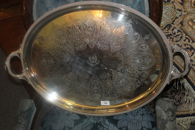 Appraisal: A LARGE SILVER PLATED OVAL TEA TRAY with engraved decoration