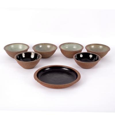 Appraisal: Studio Pottery a set of four stoneware bowls with ash