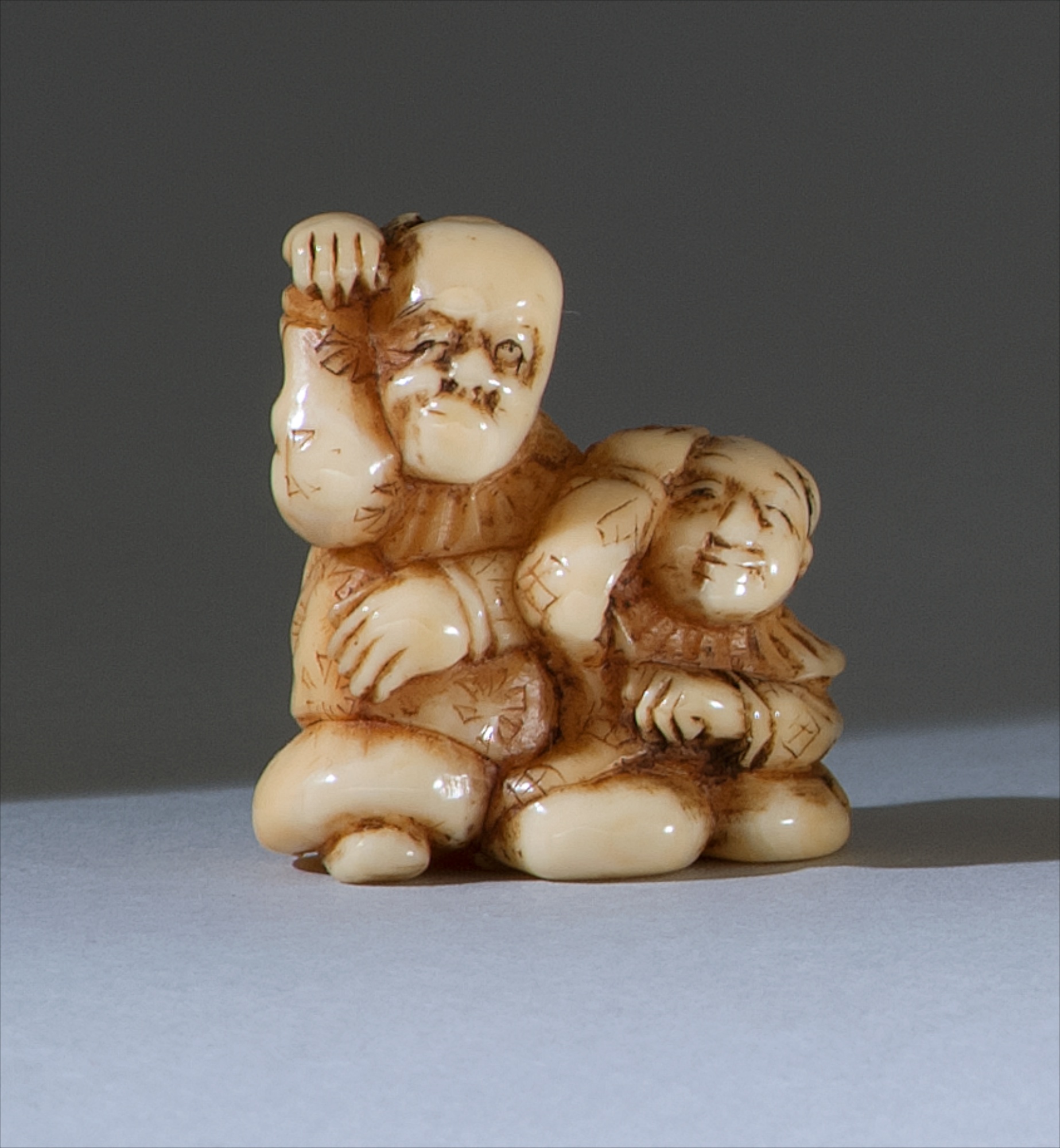 Appraisal: IVORY NETSUKE th CenturyIn the form of two karako one