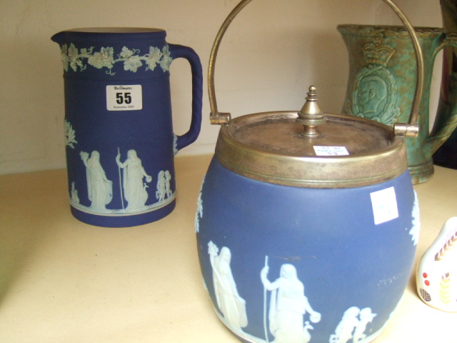 Appraisal: A Wedgwood jasper ware jug with applied Grecian figures and