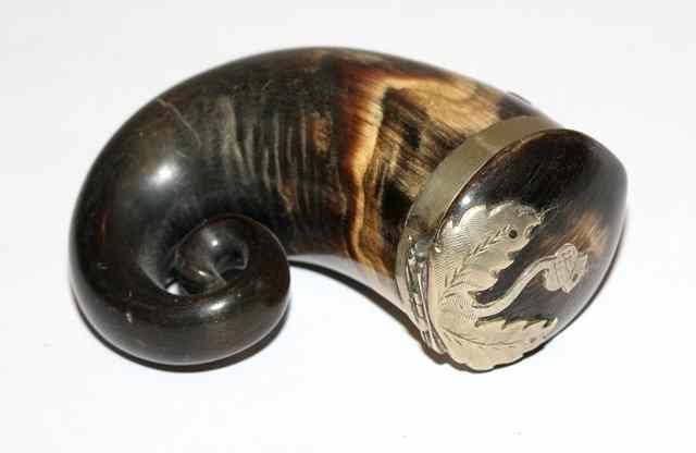 Appraisal: A SCOTTISH HORN SNUFF MULL with white metal mounts horn