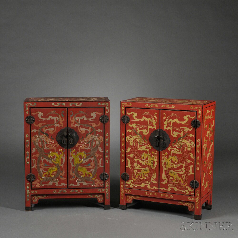 Appraisal: Pair of Red-painted Cabinets Asia with polychrome chilong decoration the