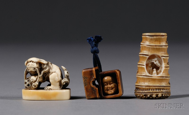 Appraisal: Three Ivory and Wood Netsuke th century a shishi with