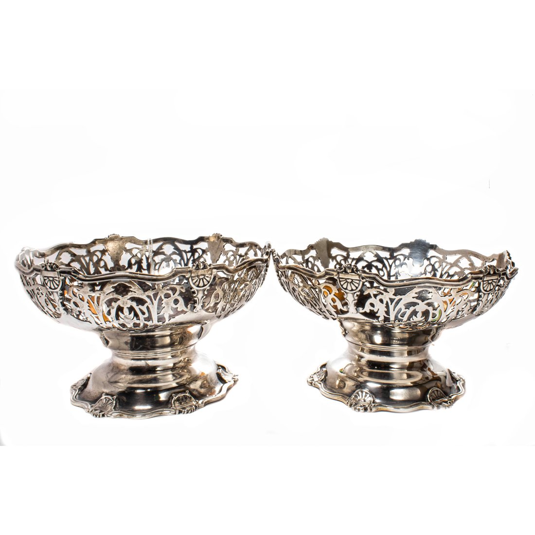 Appraisal: AN ENGLISH PAIR STERLING FOOTED COMPOTES An English pair sterling