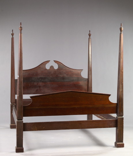 Appraisal: Early American-Style Mahogany Pencil-Post Bedstead with an arched broken-pediment headboard