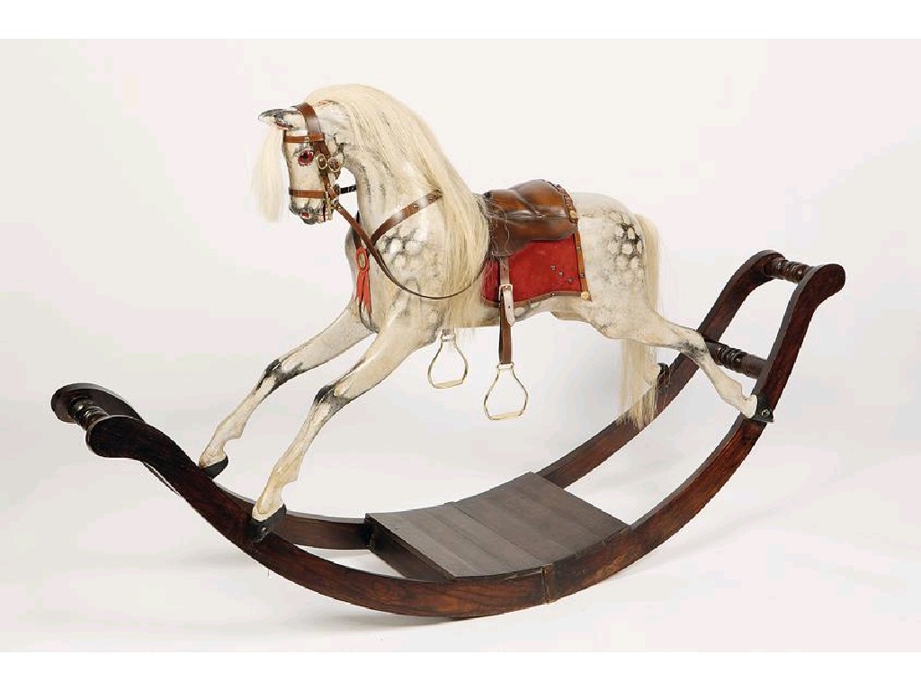 Appraisal: A VICTORIAN STYLE ROCKING HORSE the dapple grey horse with