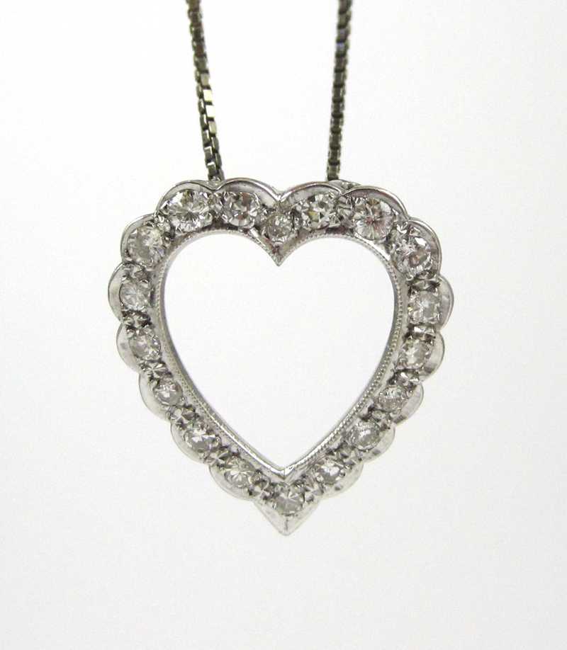 Appraisal: DIAMOND AND WHITE GOLD PENDANT NECKLACE suspended on a -