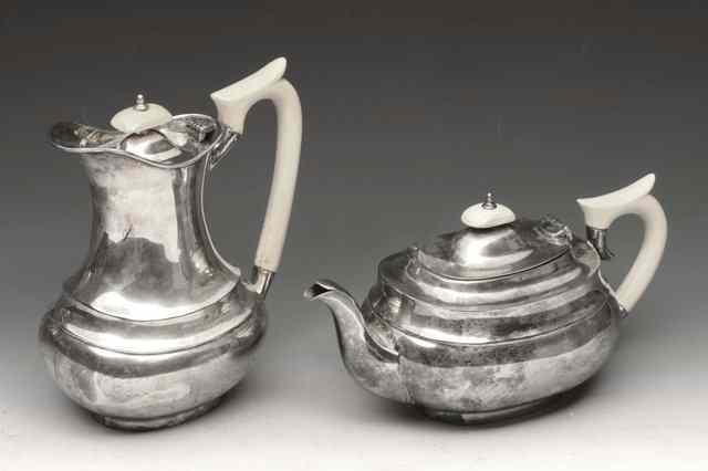 Appraisal: AN EARLY TH CENTURY SILVER COFFEE POT with ivory handle