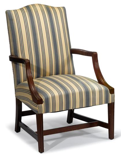 Appraisal: Mahogany reproduction lolling arm chair th century