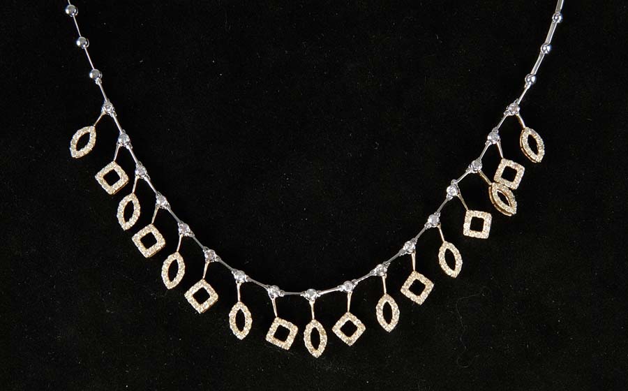 Appraisal: TWO TONE GOLD DIAMOND NECKLACE Beautiful k white gold solid